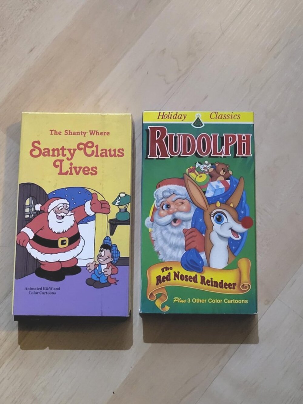 2 Vintage Santa Claus & Rudolph VHS video tapes w/ sleeves